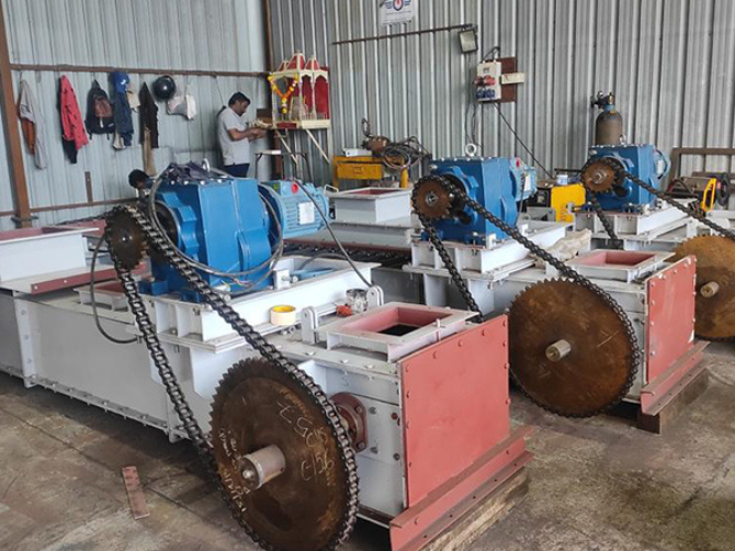 Drag Chain Conveyor & Feeder System by Powermech
